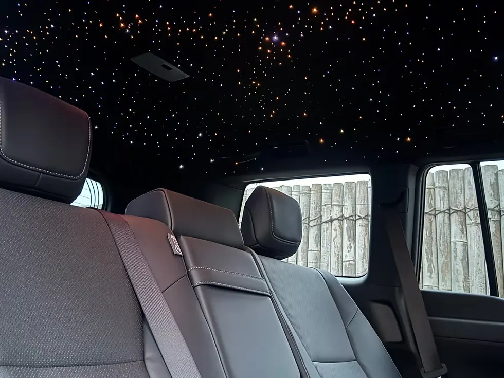 Fibre-optic starlight headliner installed in a pickup truck cabin